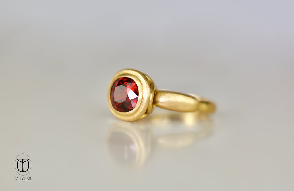 Handcrafted spessartite ring in 22 ct gold